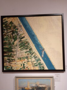 Painting of ship blocking Suez Canal.